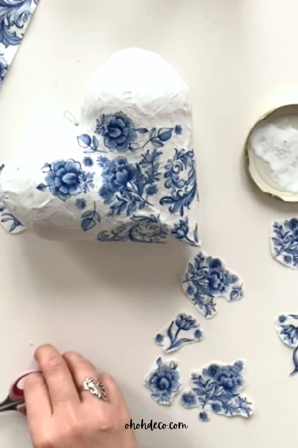 decorate the heart ornament with paper napkin
