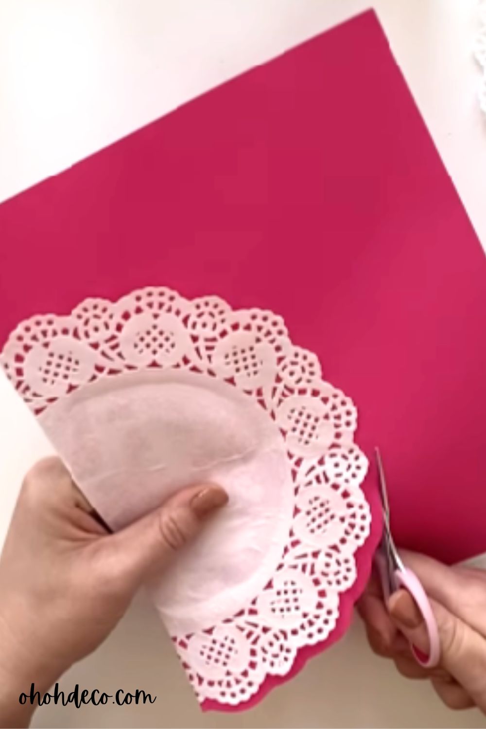 cut the paper sheet following the paper doily