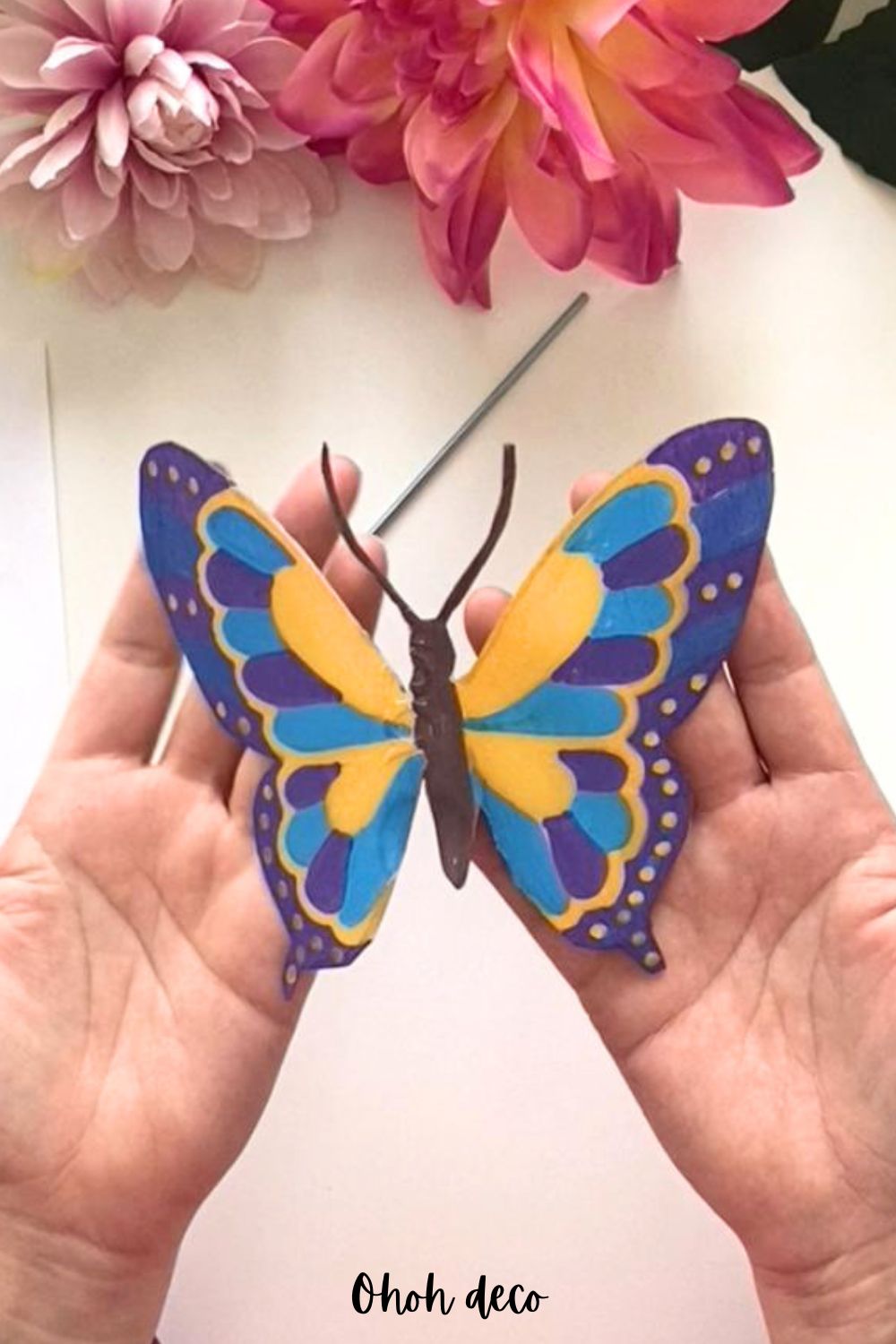 plastic butterfly to make decorative garden stake