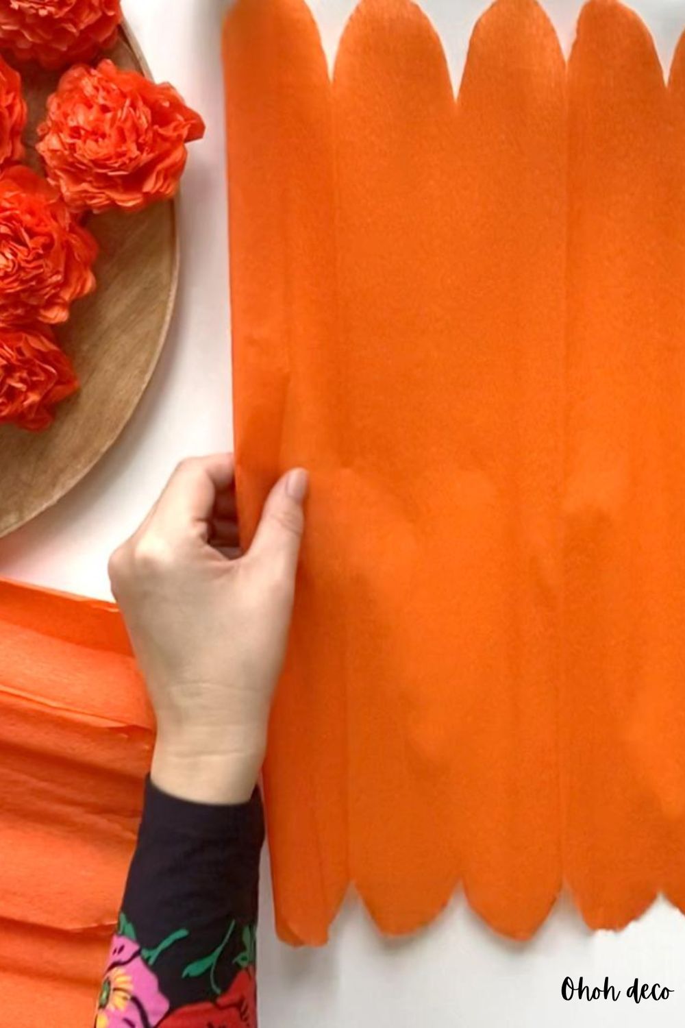 cut crepe paper to make petals